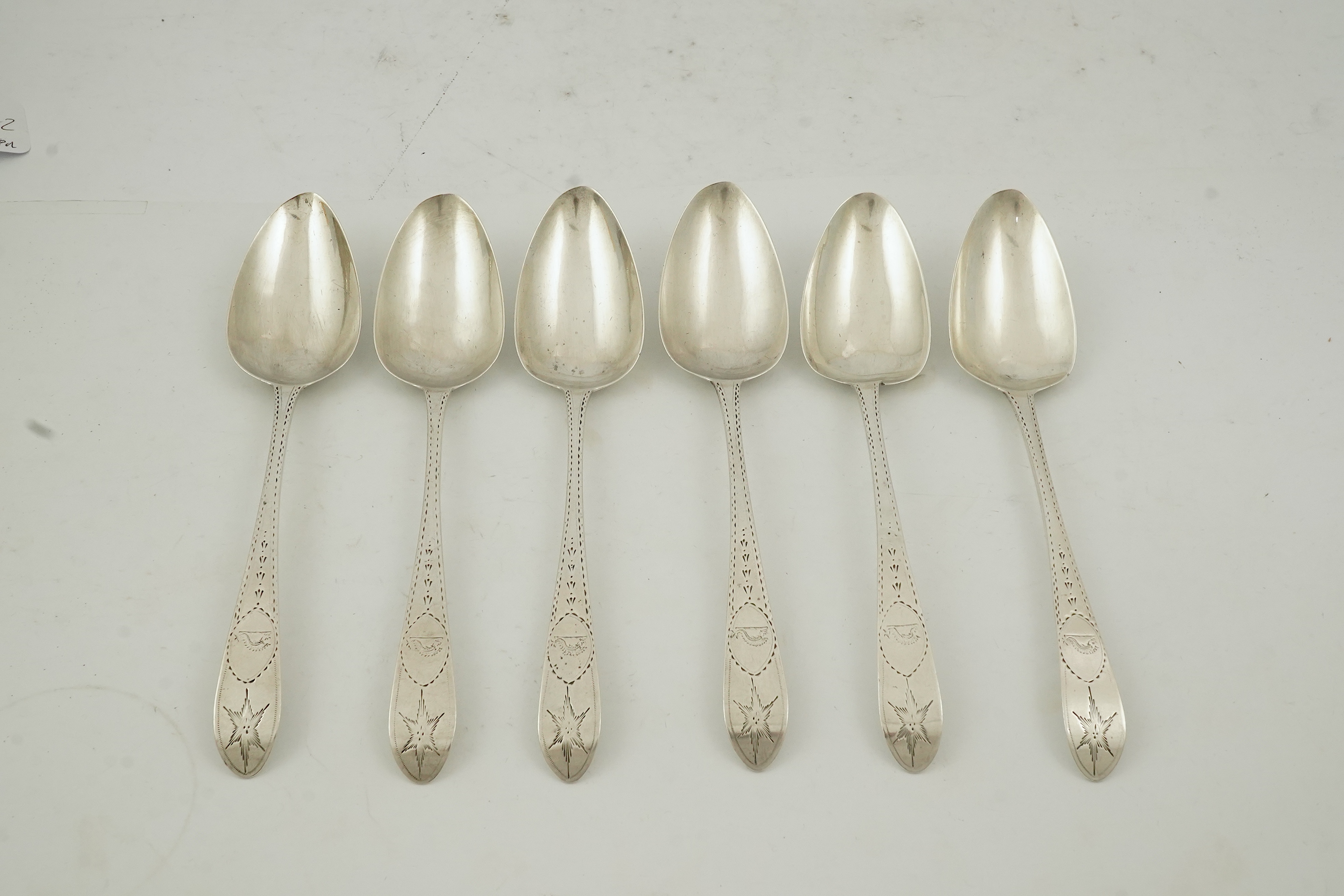 Five Victorian silver Old English pattern dessert spoons, by George Adams, London, 1880 and three other matched dessert spoons by Roberts & Dore, Sheffield, 1931, 11.6oz. Condition - fair